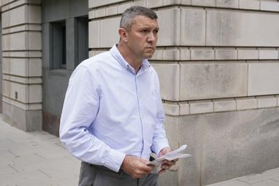 An ex-Washington police officer is convicted of lying about leaks to the Proud Boys leader