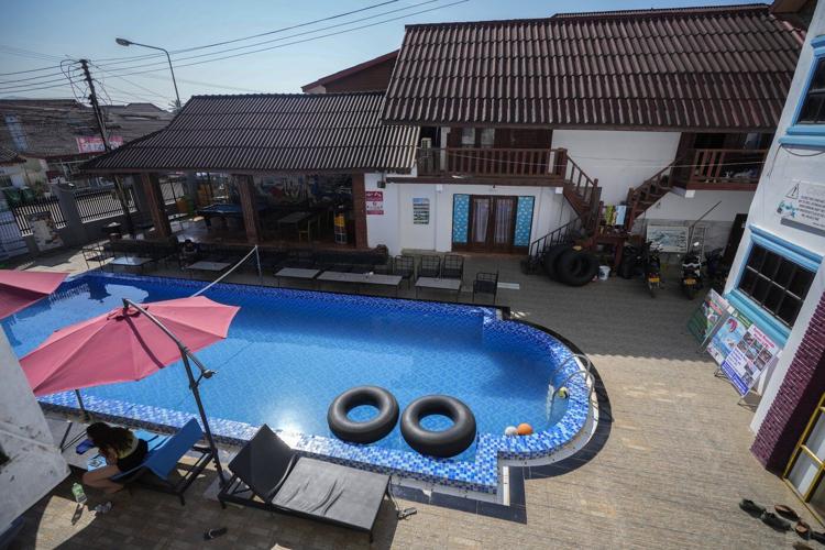 Deadly alcohol poisoning casts shadow over the Laotian backpacker town