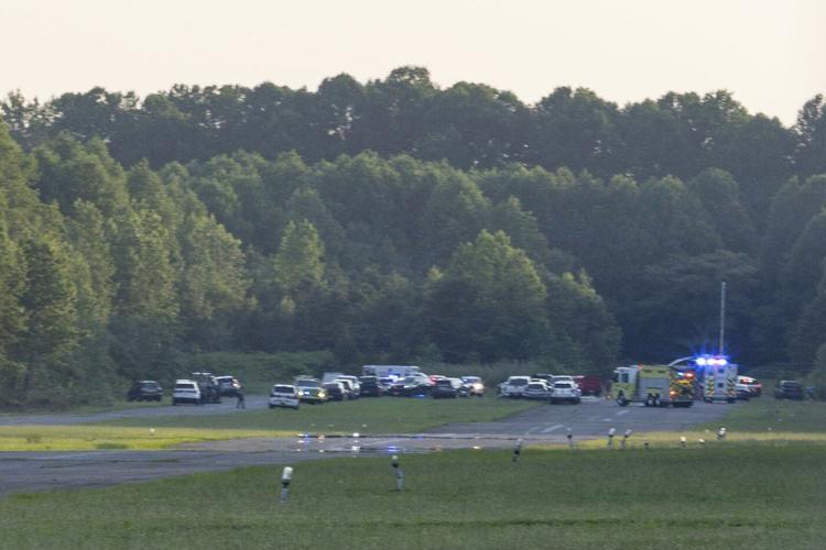 Skydiving plane goes off New Jersey runway and crashes into woods, sending 15 to hospital