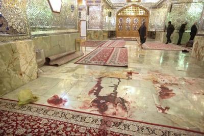 Iran's leaders try to link deadly shrine attack to protests