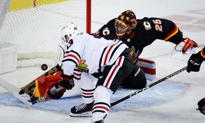 Rookie goalie Jaxson Stauber in form as Blackhawks dump Flames 5-1
