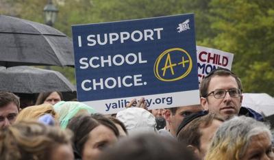 Millions of campaign dollars aimed at tilting school voucher battle are flowing into state races