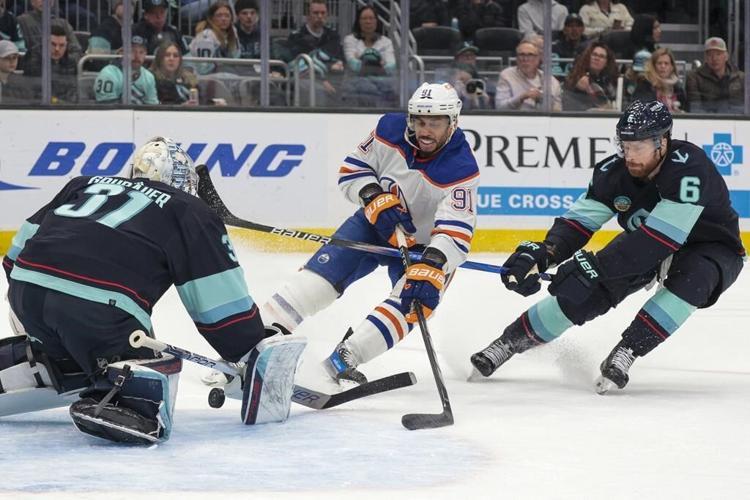 Leon Draisaitl scores his 30th goal, Stuart Skinner makes 24 saves as Oilers top Kraken 2-1