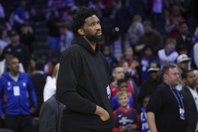 76ers' Joel Embiid is suspended by the NBA for three games for shoving a newspaper columnist