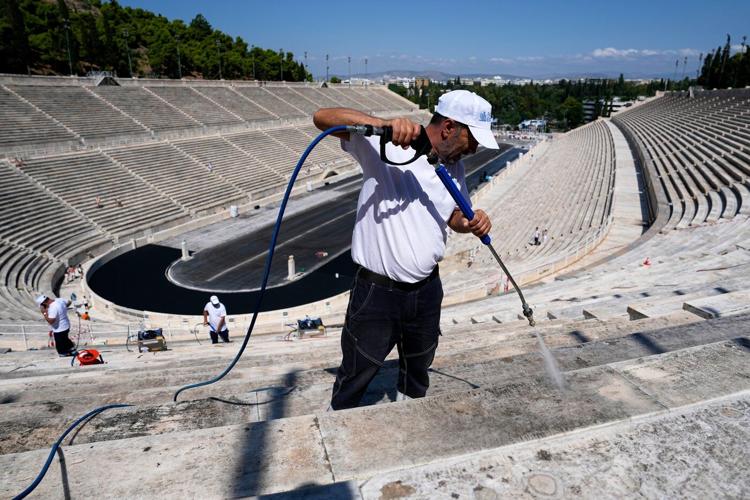 Athens is cleaning its all-marble Olympic stadium for the first time in more than a century