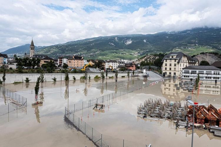 Storms in Switzerland cause flooding and a landslide that left at least 2 people dead