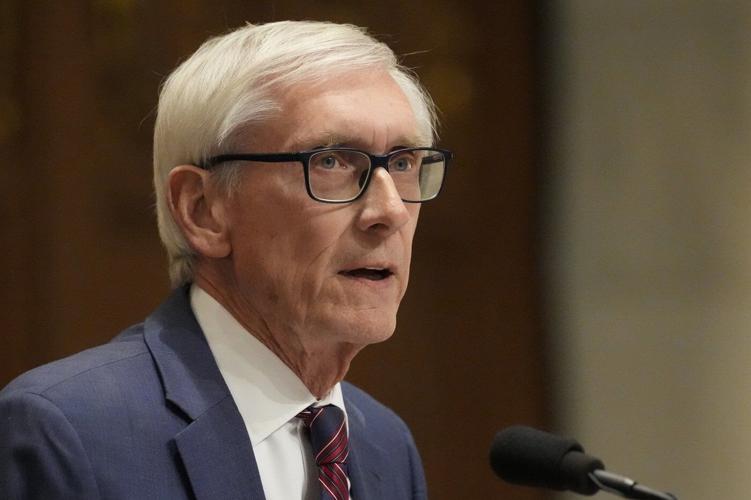 Governor signs budget in early morning to secure Medicaid funds