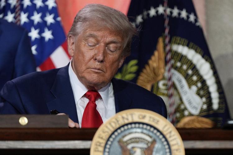 The Latest: Trump to visit Federal Reserve as feud with its chair continues