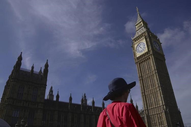 UK resists calls to label China a threat following claims a Beijing spy worked in Parliament