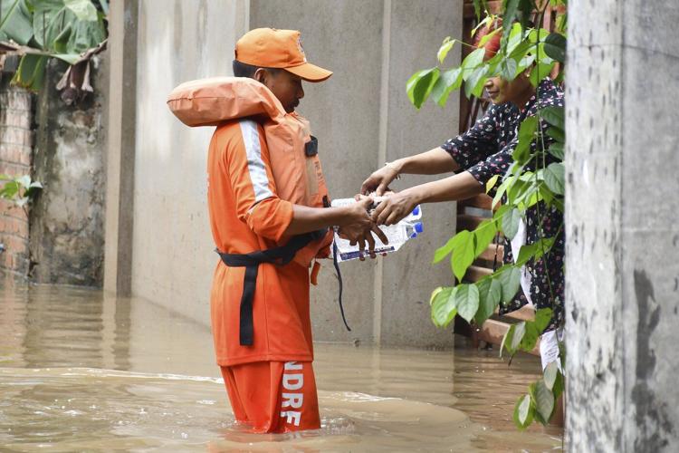 India's monsoon floods kill at least 22 people in the country's northeast