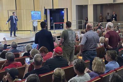 Nebraska congressman Flood gets an earful over Trump's tax cut law in raucous town hall