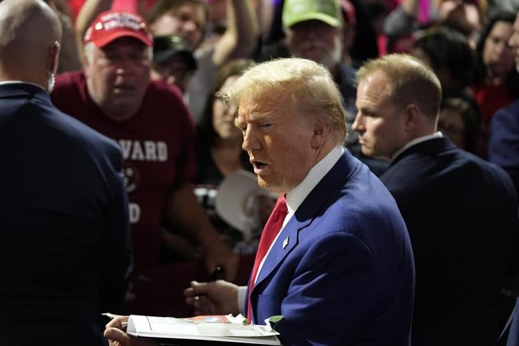 The Latest: Harris and Trump campaigns pivot to turnout as early voting begins