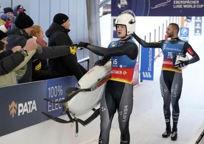 Eitberger, Latvia win luge golds; US gets silver in doubles