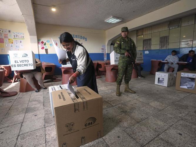 Ecuador votes for president, with the conservative incumbent and a leftist lawyer in the lead