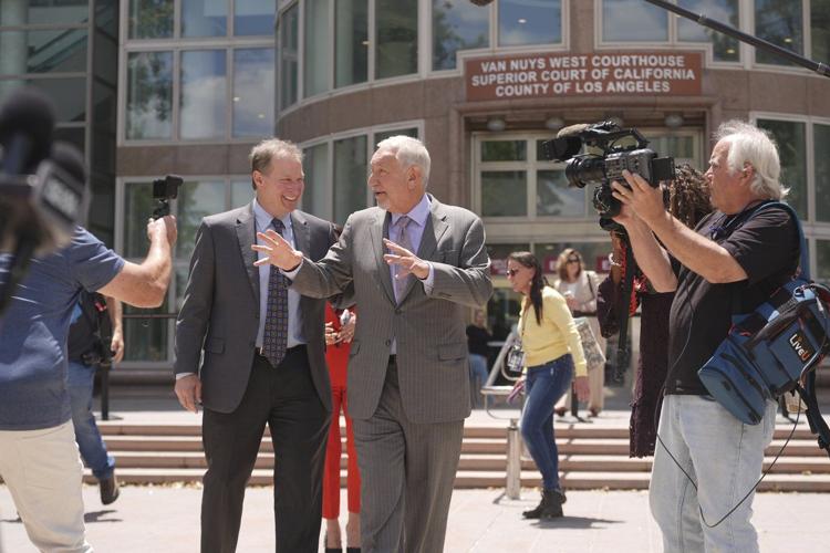 Judge reduces Menendez brothers' murder sentences, putting them a step closer to freedom