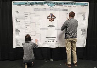 NCAA presents options to expand March Madness tournaments from current 68 teams, AP source says