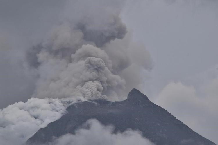 Indonesia evacuates about 6,500 people on the island of Flores after a volcano spews clouds of ash