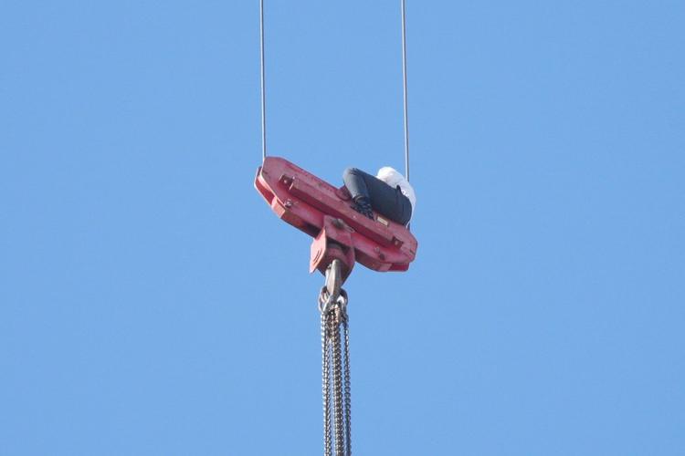 Fire teams rescue 15-year-old stuck on crane over high-rise building in Jerusalem