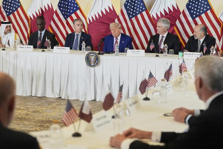 Live updates: Trump visits main U.S. military base in Middle East as violence flares in Gaza