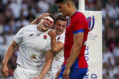 Ireland edges South Africa in Rugby World Cup clash of titans. England romp and Portugal draw