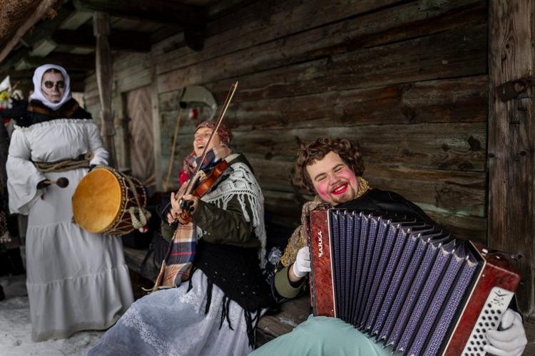 Photos show masked revelers celebrating Shrovetide in Lithuania
