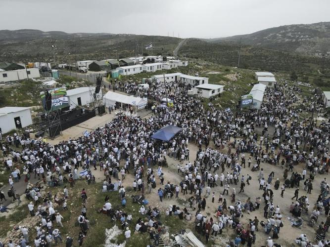 In mass rally, Israeli settlers march to West Bank outpost