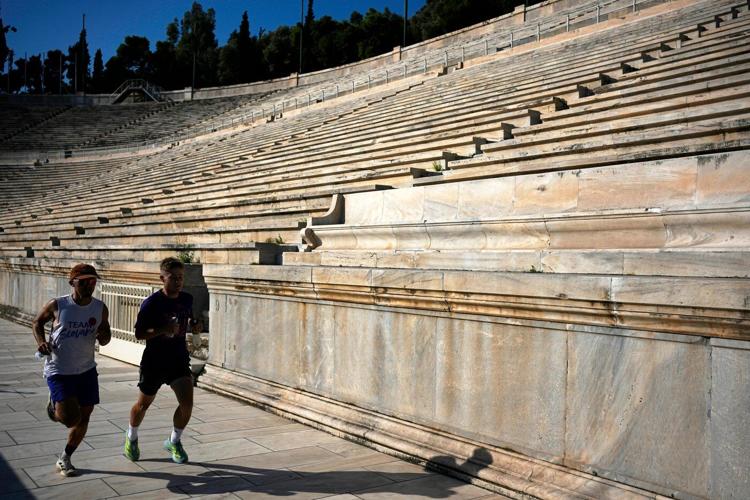 Athens is cleaning its all-marble Olympic stadium for the first time in more than a century