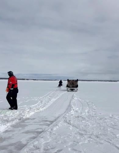 Helicopter, snowmobiles help retrieve car abandoned on sea ice 3 km from N.S. shore