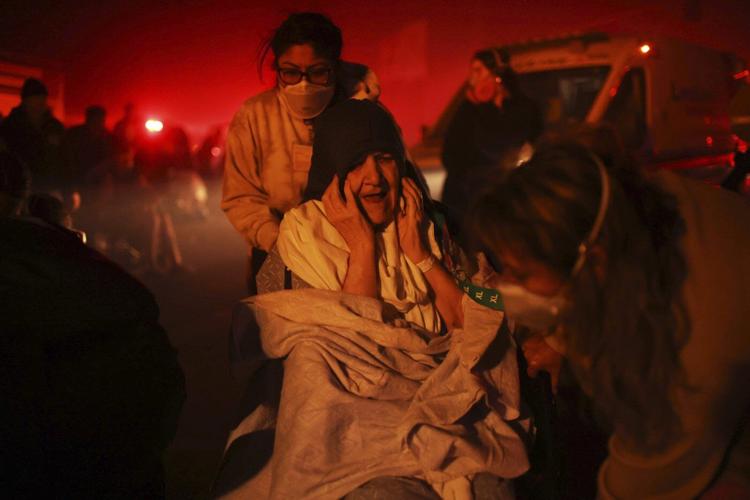 What to know about wildfires raining embers onto the Los Angeles area