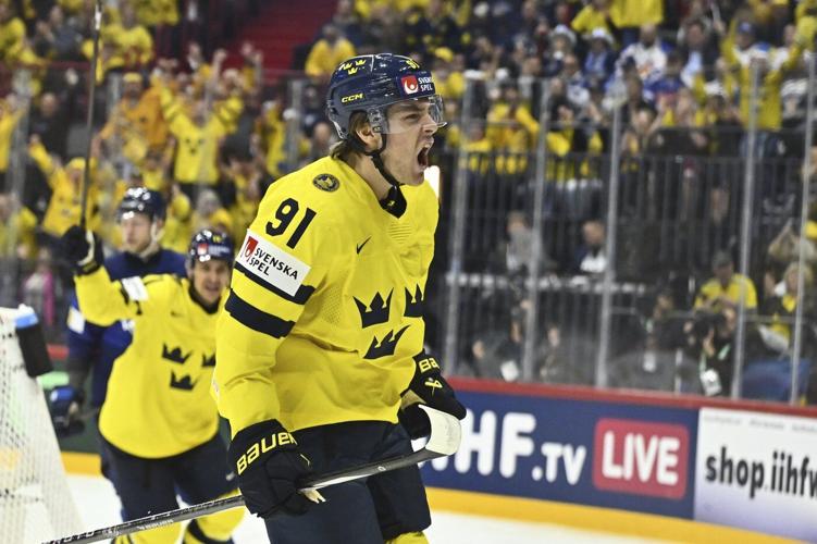 Switzerland shuts out US at ice hockey worlds, Sweden tops Finland and Czechs down Denmark