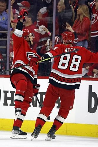 Hurricanes hold on to beat Islanders 2-1 in playoff opener