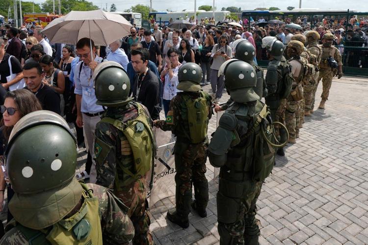 Protesters block the main entrance to COP30 climate talks in Brazil