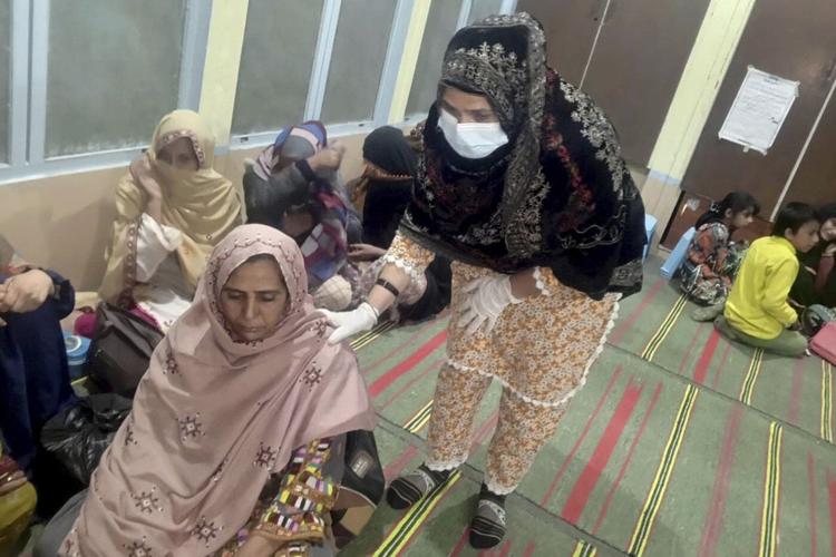 Pakistani insurgents attack a train carrying hundreds of people and take hostages