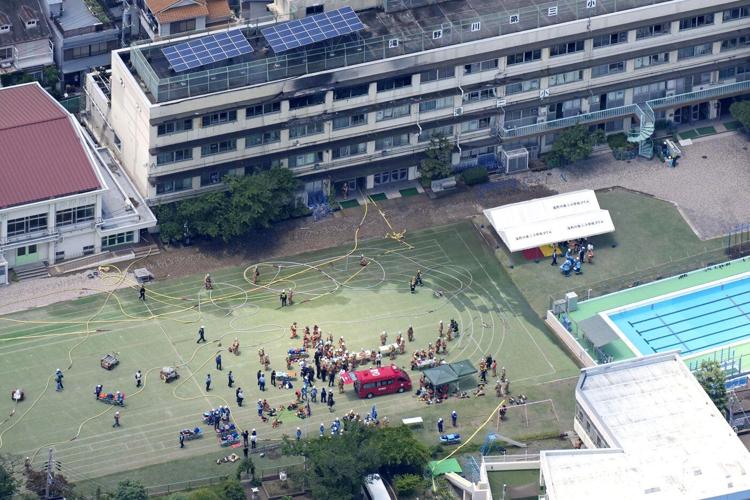 About 300 children and teachers evacuated or rescued after fire breaks out at a Tokyo school