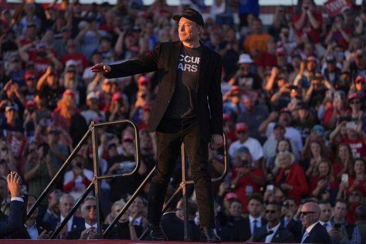 Elon Musk makes his first appearance at a Trump rally and casts the election in dire terms