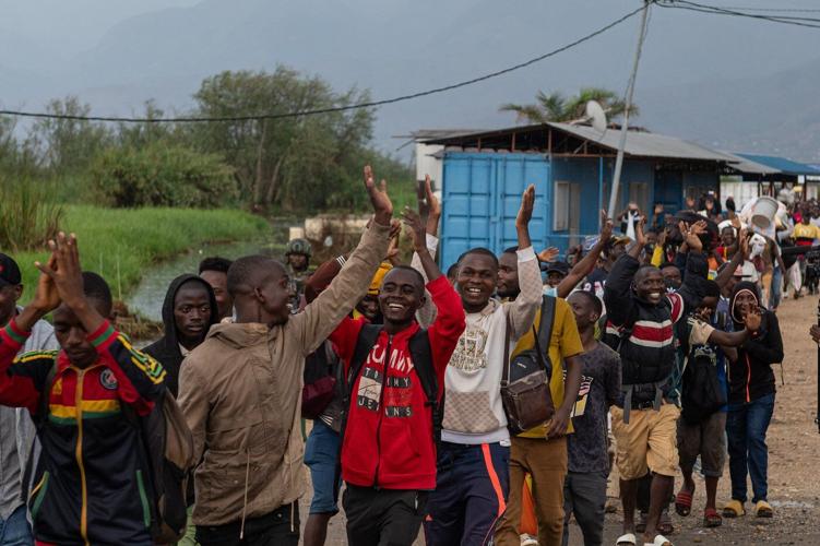 Rwanda-backed M23 rebels say they will withdraw from seized city in eastern Congo