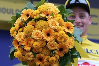 Tour de France: Van der Poel holds off Pogačar to win rainy stage 2