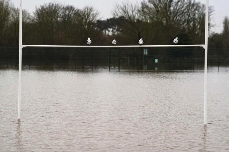 Extreme cold leaves thousands without power in Nordic countries as floods persist in Germany