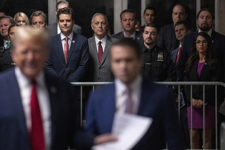 Matt Gaetz evokes 'standing by' language adopted by Proud Boys as he attends court with Donald Trump