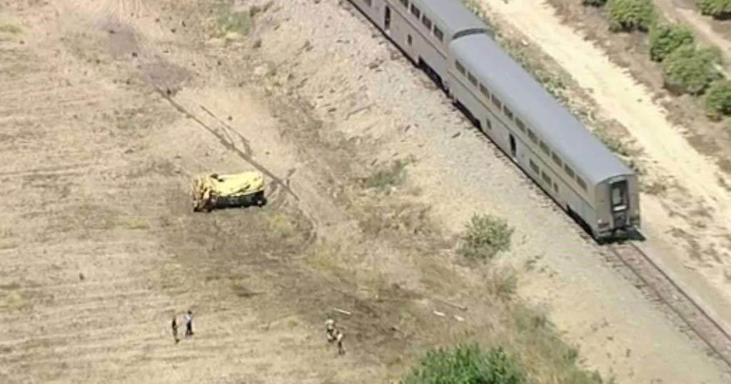 Amtrak train with 198 passengers derails after hitting truck on tracks ...