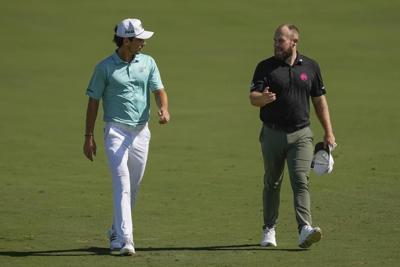 Rory McIlroy tied for lead in Dubai, hot-headed Tyrell Hatton fades