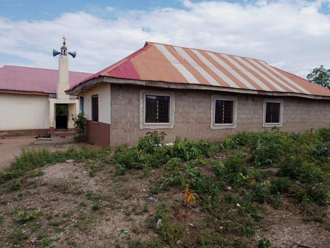 Islamic State militants kill at least 29 in an attack on a village in northeastern Nigeria
