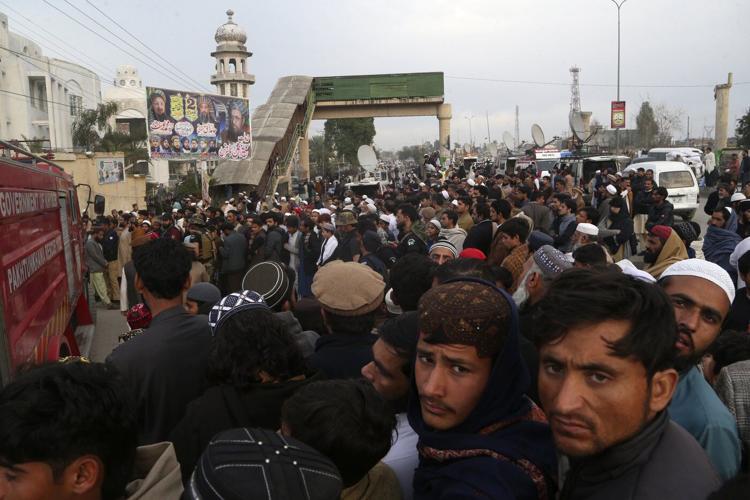 Thousands attend funeral for senior Taliban-linked cleric slain in Pakistan's northwest