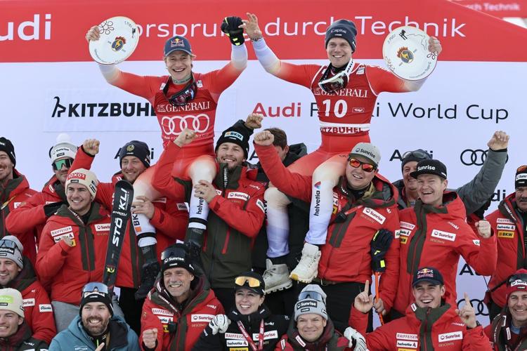 Swiss skier Marco Odermatt takes eventful World Cup super-G for 1st win in Kitzbuehel
