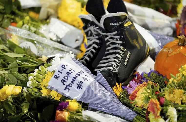 Adam Johnson's UK team retires his jersey number after the American player's skate-cut death