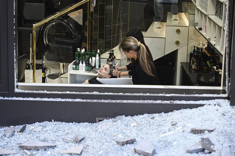 Peace efforts in limbo as Ukraine's capital mourns 23 dead after Russian attack