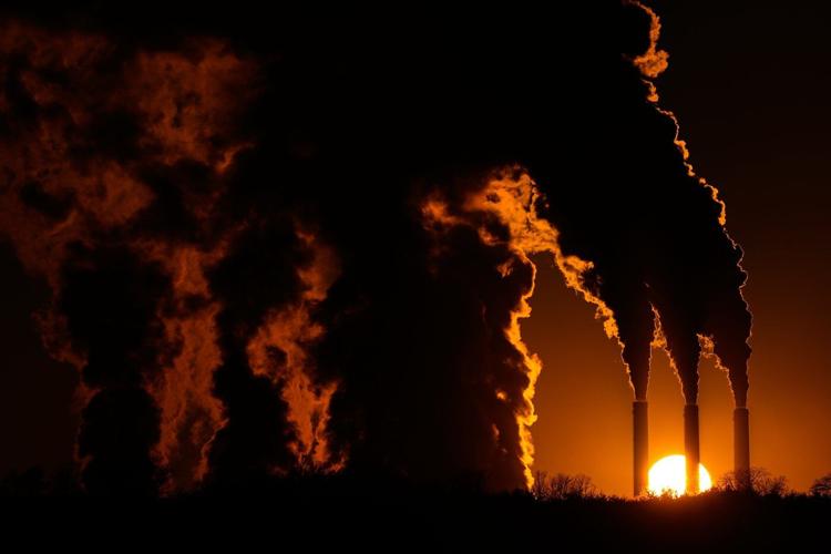 Climate report says world won't get as hot as feared but will pass warming limit