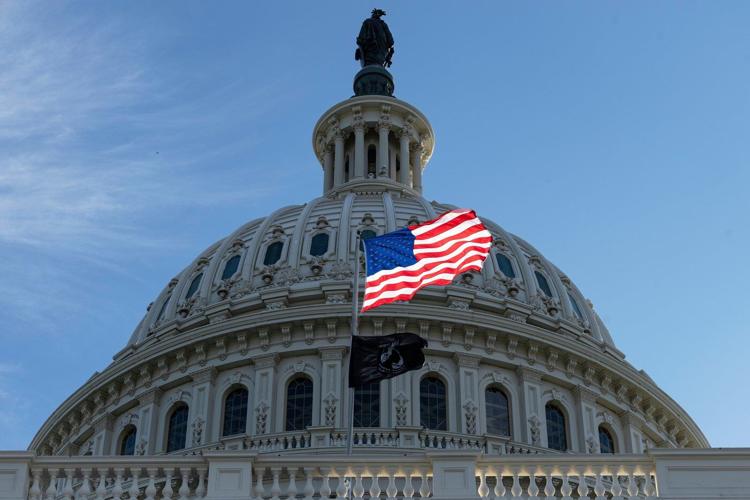 Who flies the American flag for holidays - and who never flies one, according to an AP-NORC poll