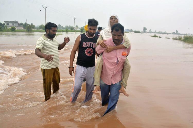 Pakistani rescuers use drones to help them evacuate thousands as floods devastate Punjab