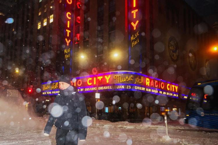 Northeast sees more snow from the tail end of a colossal winter storm, at least 18 deaths reported